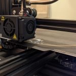 Print head over an empty plate