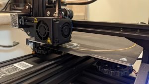 Print head over an empty plate