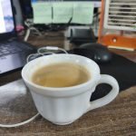 Three sticky notes and a cup of tea
