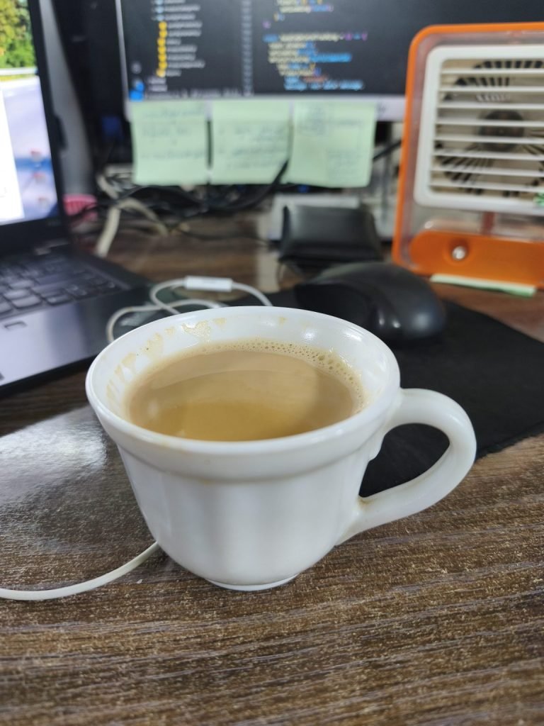 Three sticky notes and a cup of tea