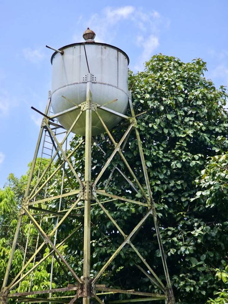 Riveted water tank on steel legs